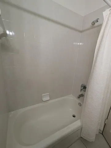 a bathroom with a bathtub