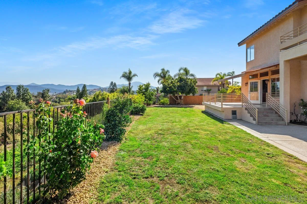 1819 Monarch Ridge Circle El Cajon, CA 92019 - Photo 24 of 60 a view of a backyard with plants and a garden