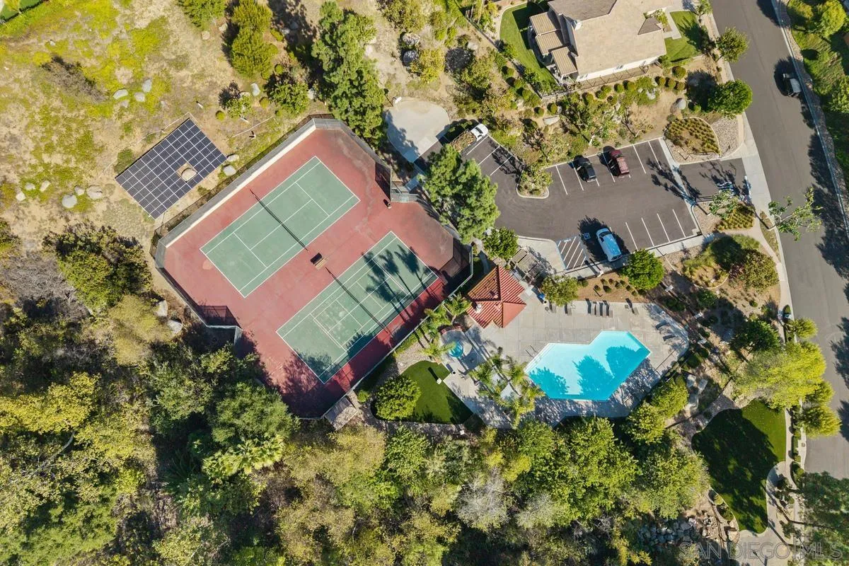 1819 Monarch Ridge Circle El Cajon, CA 92019 - Photo 51 of 60 an aerial view of a house with a yard and swimming pool