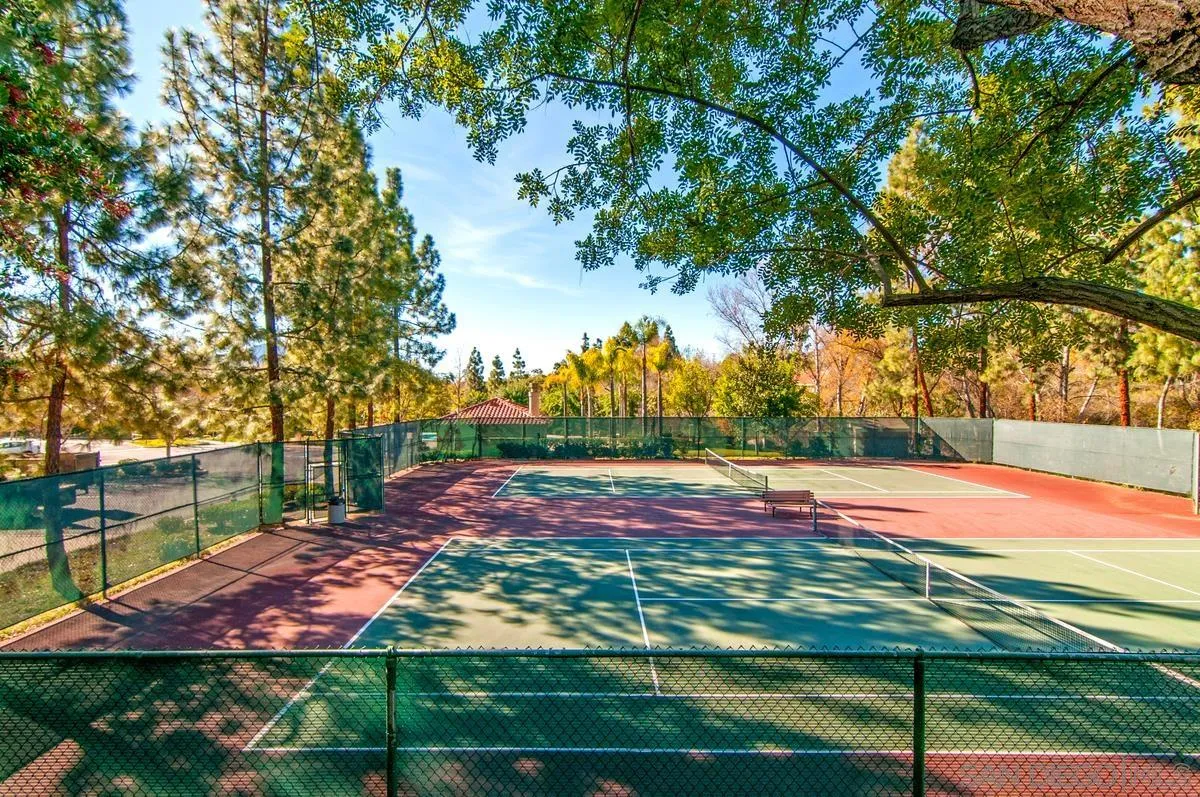 1819 Monarch Ridge Circle El Cajon, CA 92019 - Photo 55 of 60 a view of a tennis ground with large trees
