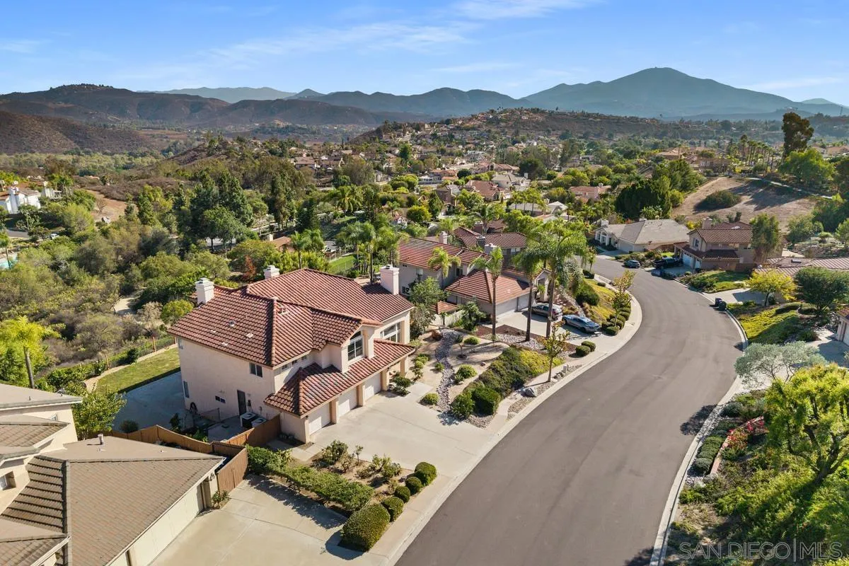 1819 Monarch Ridge Circle El Cajon, CA 92019 - Photo 58 of 60 an aerial view of a house with a mountain