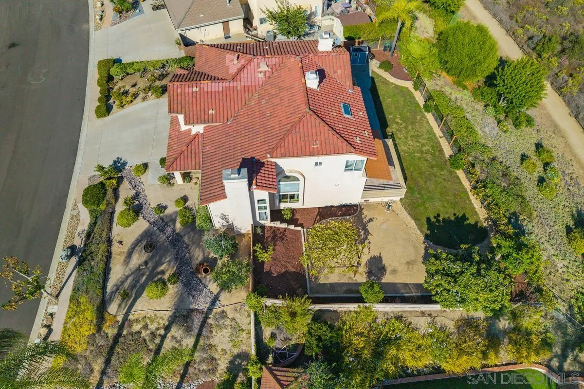 1819 Monarch Ridge Circle El Cajon, CA 92019 - Photo 59 of 60 an aerial view of a house with a yard and garden