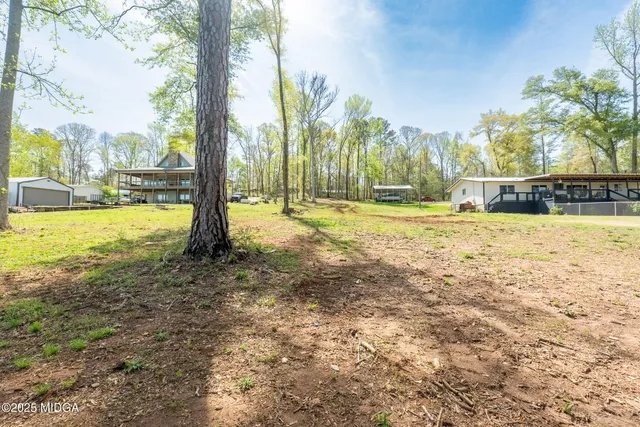a view of residential houses with outdoor space