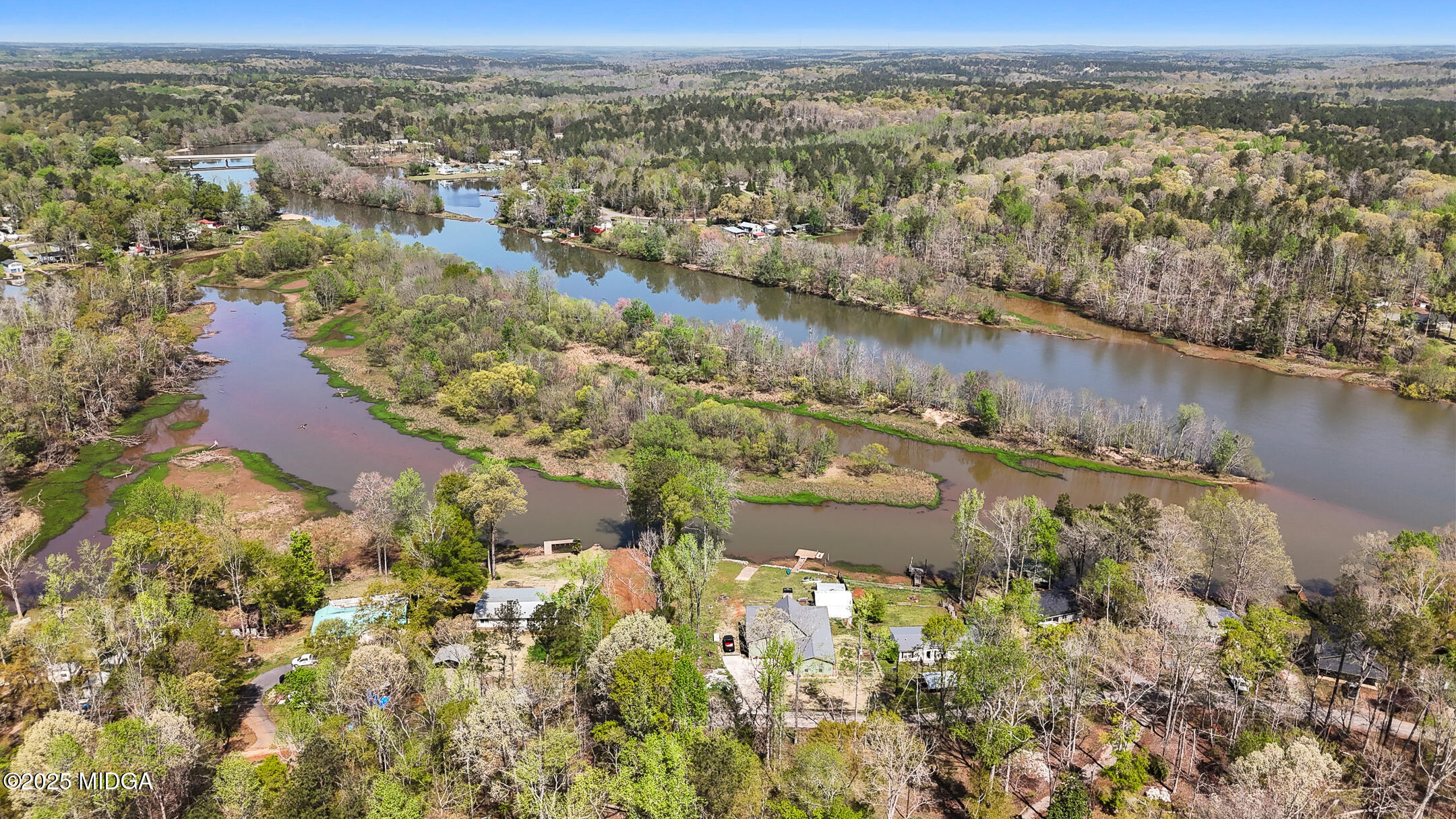 0 Henry Higgins Road Jackson, GA 30233 - Photo 9 of 12 an aerial view of residential houses with outdoor space and lake view