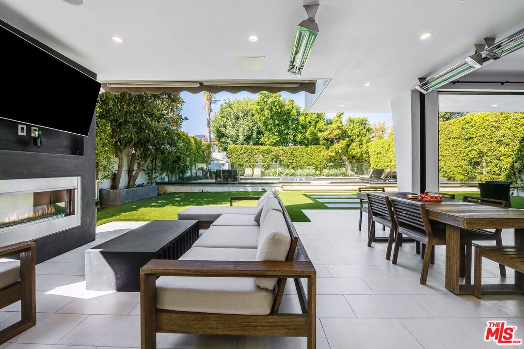 5101 Rubio Avenue Encino, CA 91436 - Photo 10 of 23 a room with pool table and a chairs