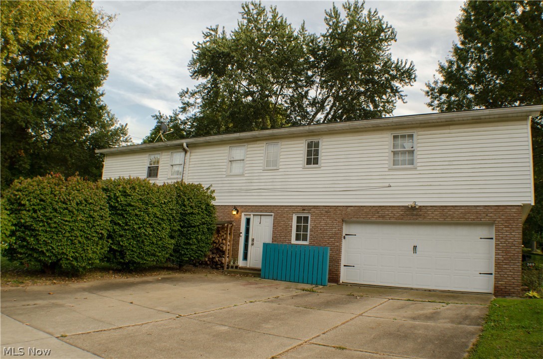 369 Sand Run Road Akron, OH 44313 - Photo 35 of 35 Although the address is Sand Run Road the drive is on the side street Overwood Rd. Door leads to the family room level, the fenced area is for trash can storage.