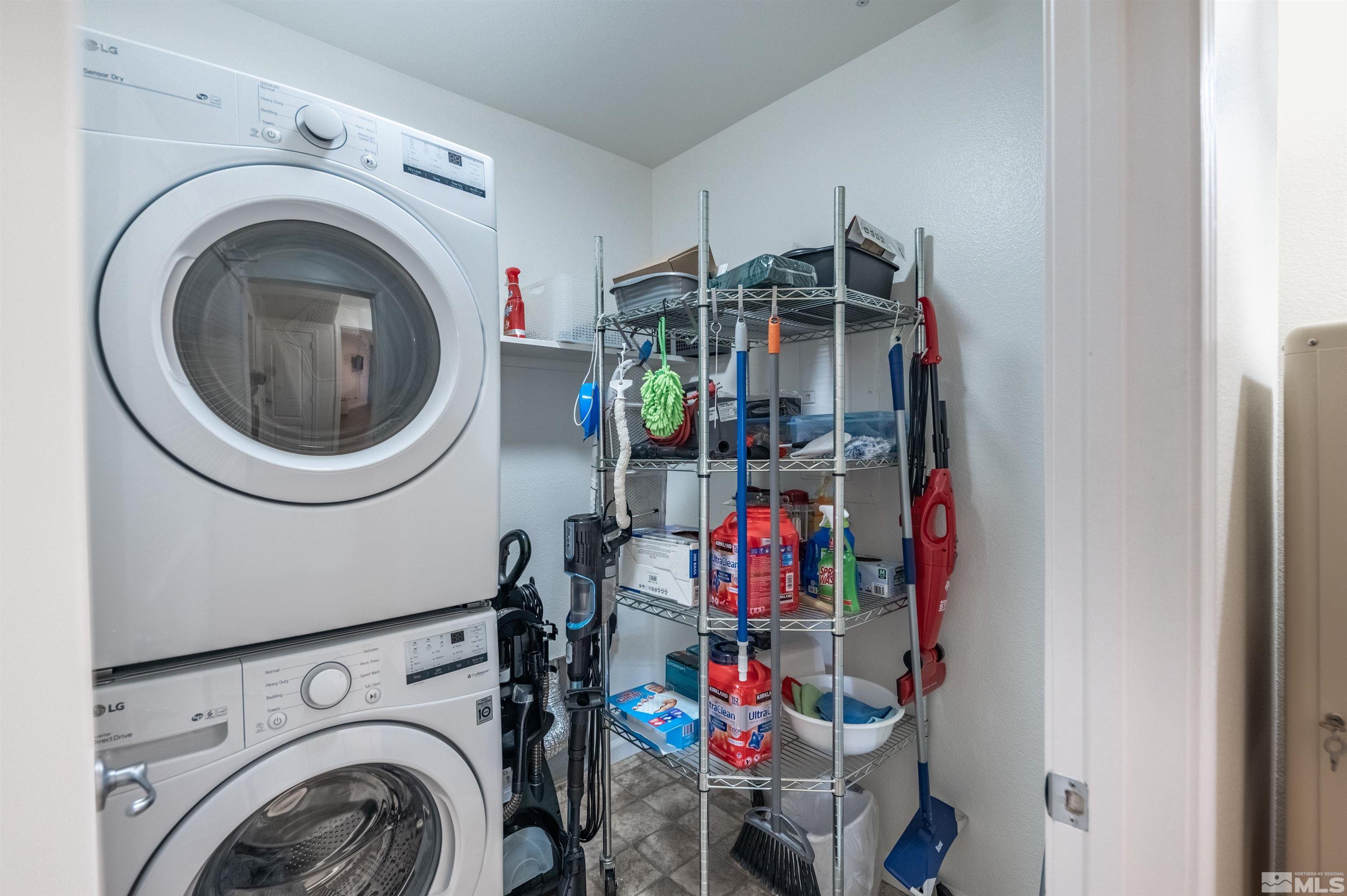 9050 Double R Boulevard, Unit 1925 Reno, NV 89521 - Photo 24 of 32 a utility room with dryer and washer