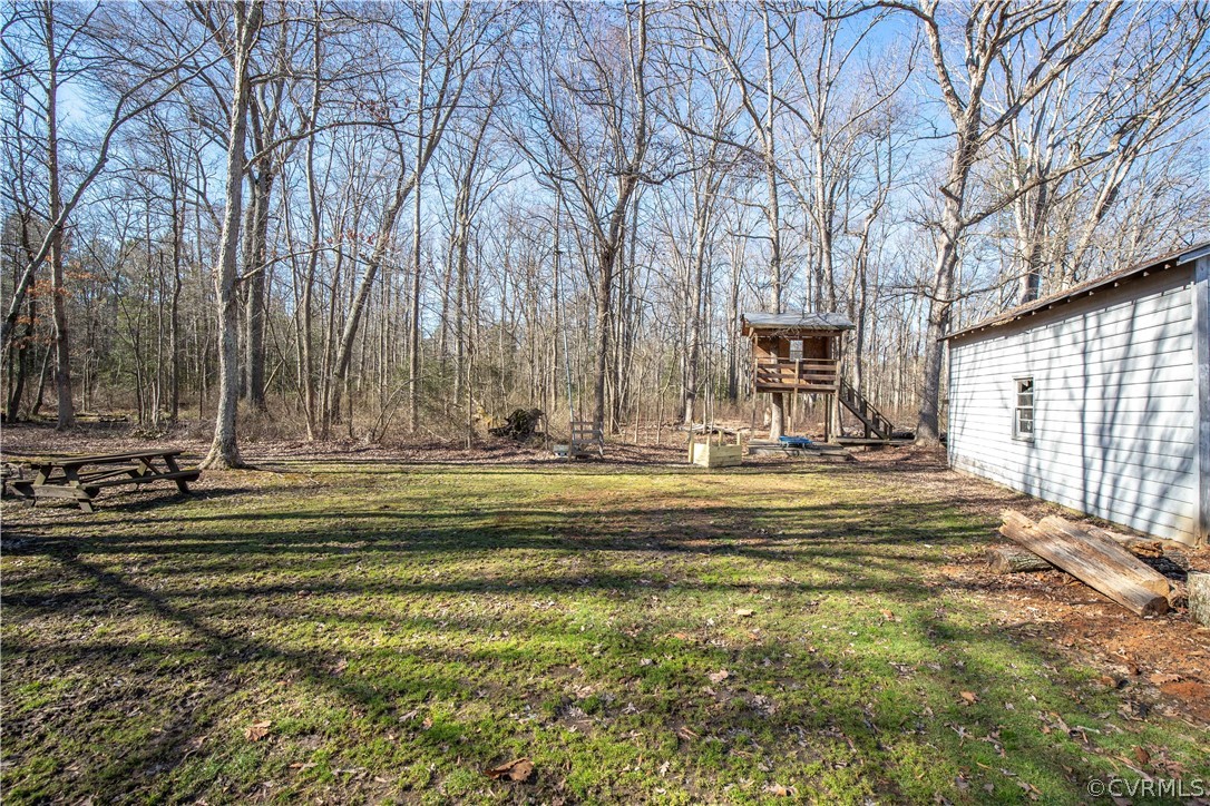 12267 Melton Road Ashland, VA 23005 - Photo 8 of 38 nice firepit area behind fenced yard