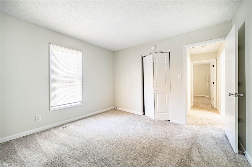 121 Westview Drive, Unit 43 Carrboro, NC 27510 - Photo 11 of 15 2nd bedroom facing hall