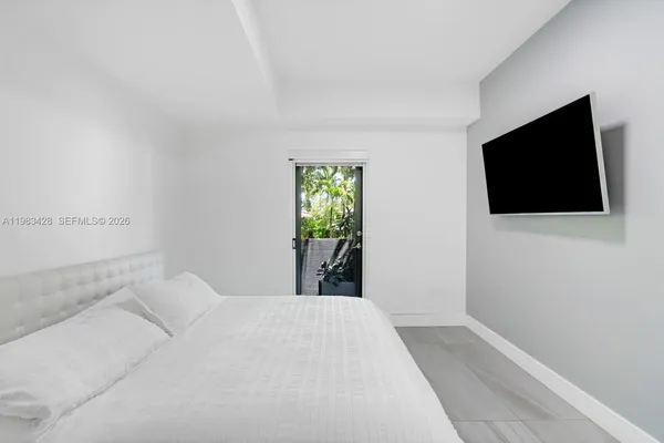 a view of a livingroom with a flat screen tv