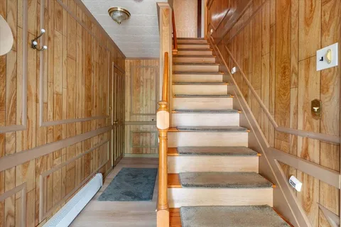 a view of an entryway with staircase