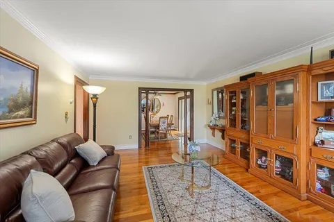 a living room with furniture and a table
