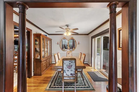 a view of a hallway with furniture
