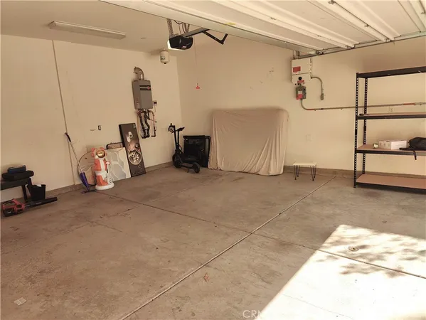 a view of a room with storage and utility room