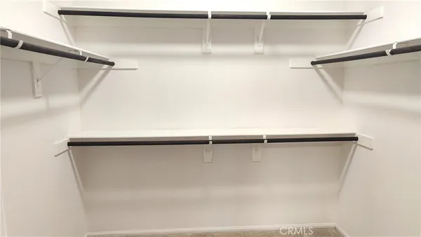 a bathroom with a granite countertop bathtub and a shower