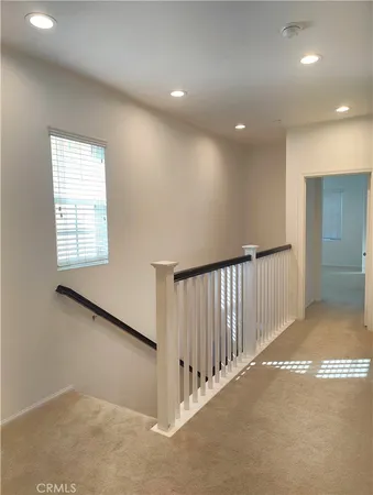 a view of a livingroom with a staircase