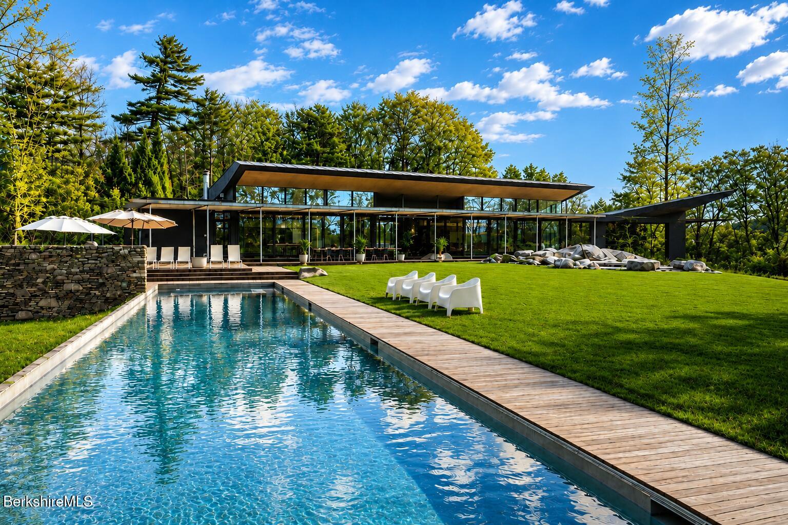 250 Long Pond Road Great Barrington, MA 01230 - Photo 55 of 56 a view of a house with swimming pool