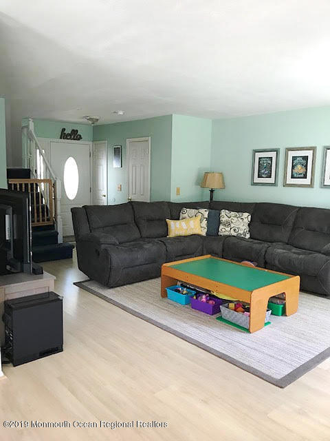 50 Sweet Gum Road Howell, NJ 07731 - Photo 3 of 18 a living room with furniture and a couch