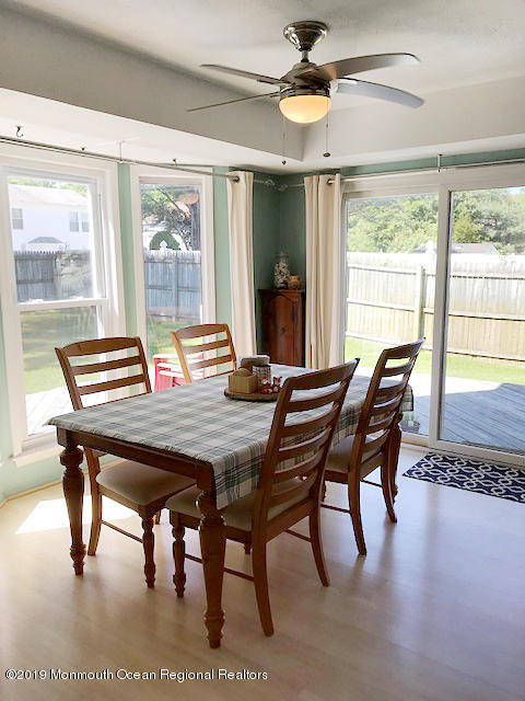 50 Sweet Gum Road Howell, NJ 07731 - Photo 4 of 18 a view of a dining room with furniture window and outside view