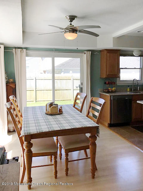 50 Sweet Gum Road Howell, NJ 07731 - Photo 5 of 18 a view of a dining room with furniture window and outside view