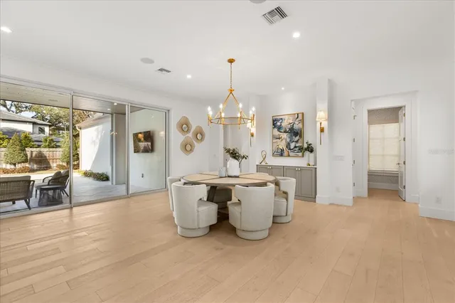 a en suite bathroom with a sink double vanity and a mirror