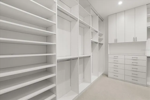 an aerial view of a residential apartment building with a yard