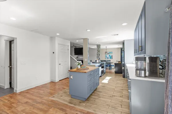 a living room with furniture fireplace and flat screen tv