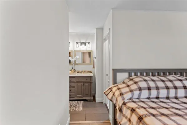 a white toilet sitting next to a small bathroom