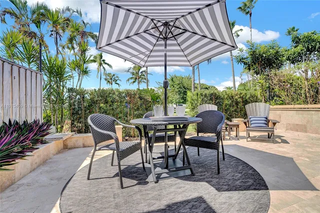 a patio with an outdoor seating
