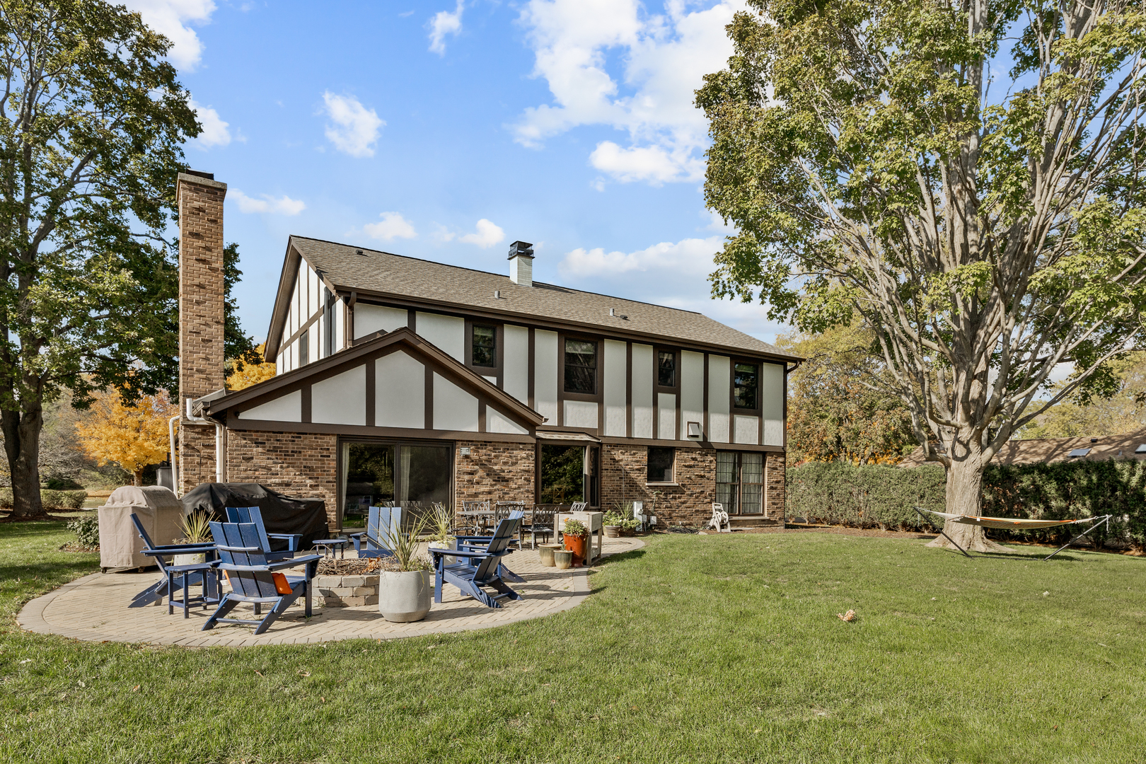 2544 Rfd Shenandoah Lane Long Grove, IL 60047 - Photo 6 of 10 a view of a house with sitting area and garden