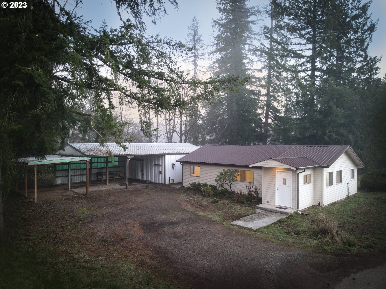 122 Talbott Road Salkum, WA 98582 - Photo 1 of 32 a view of a house with a yard porch and sitting area