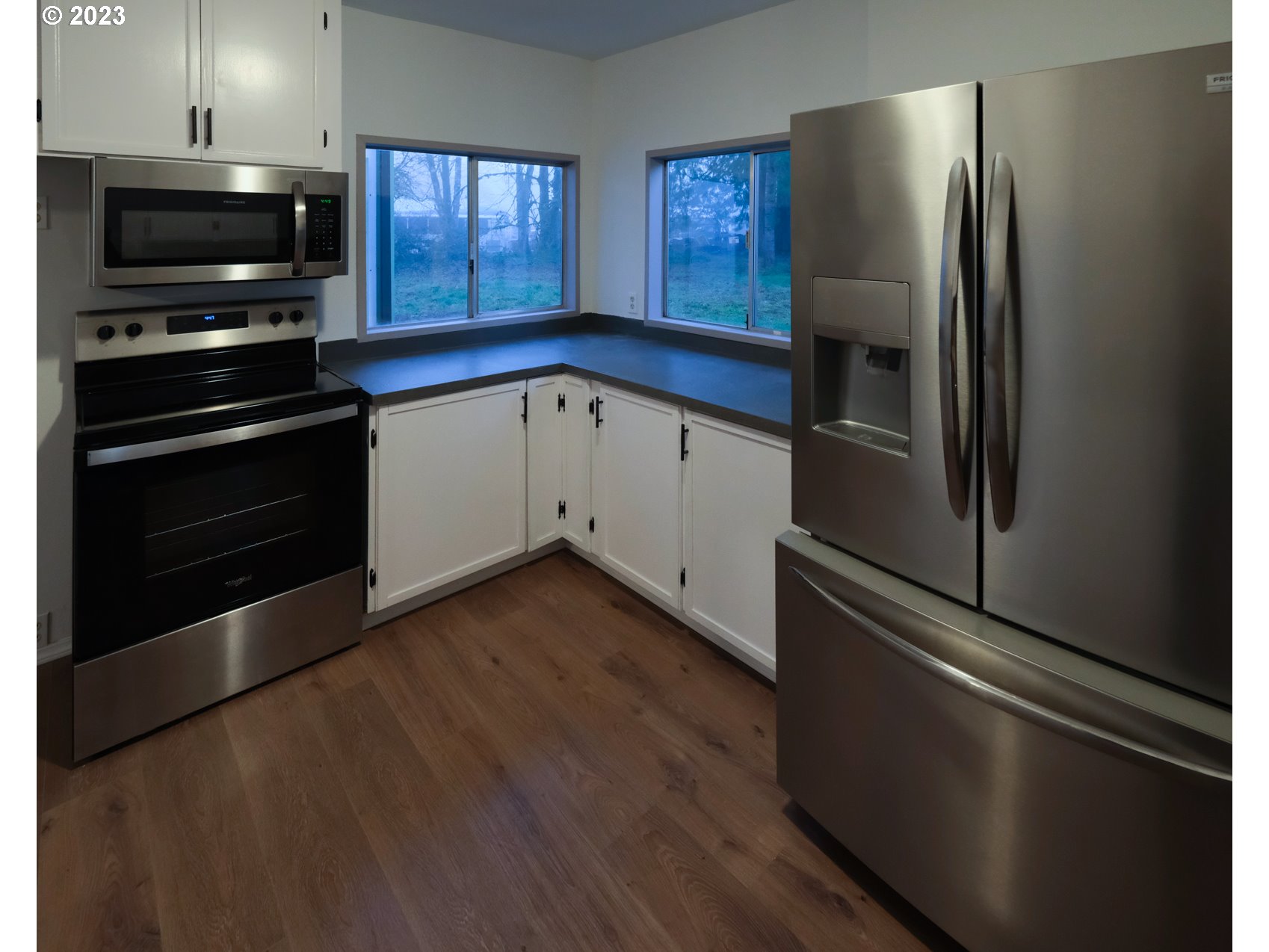 122 Talbott Road Salkum, WA 98582 - Photo 21 of 32 a kitchen with a refrigerator stove and microwave