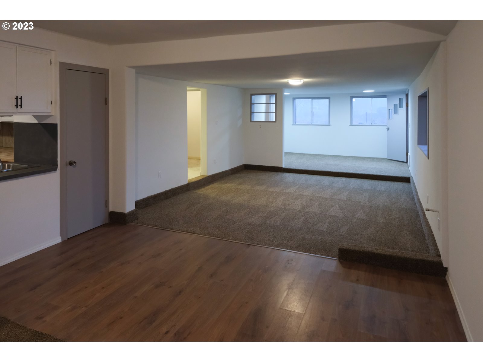 122 Talbott Road Salkum, WA 98582 - Photo 24 of 32 a view of an empty room with wooden floor and a window