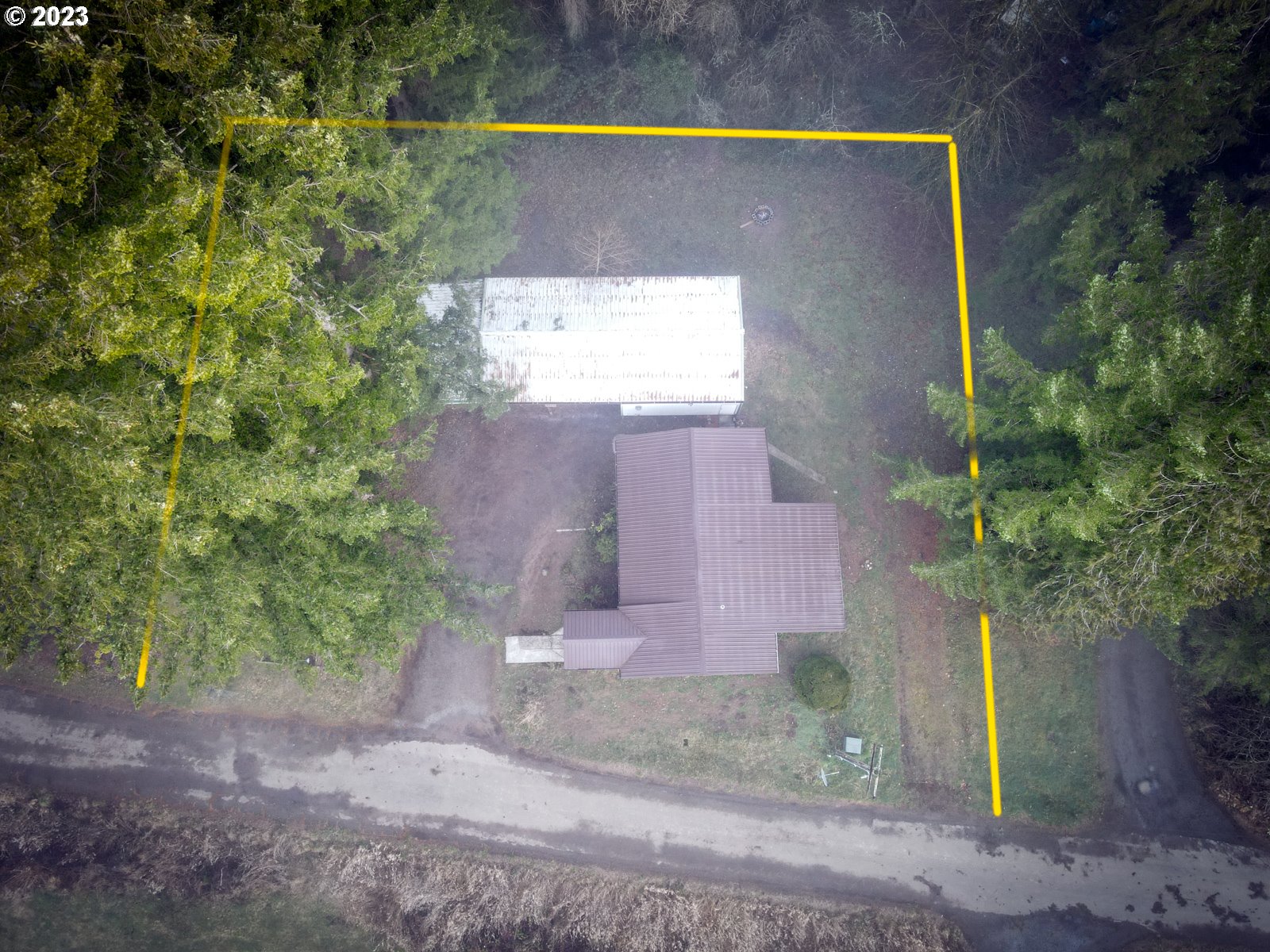 122 Talbott Road Salkum, WA 98582 - Photo 3 of 32 a view of brick wall with a small yard