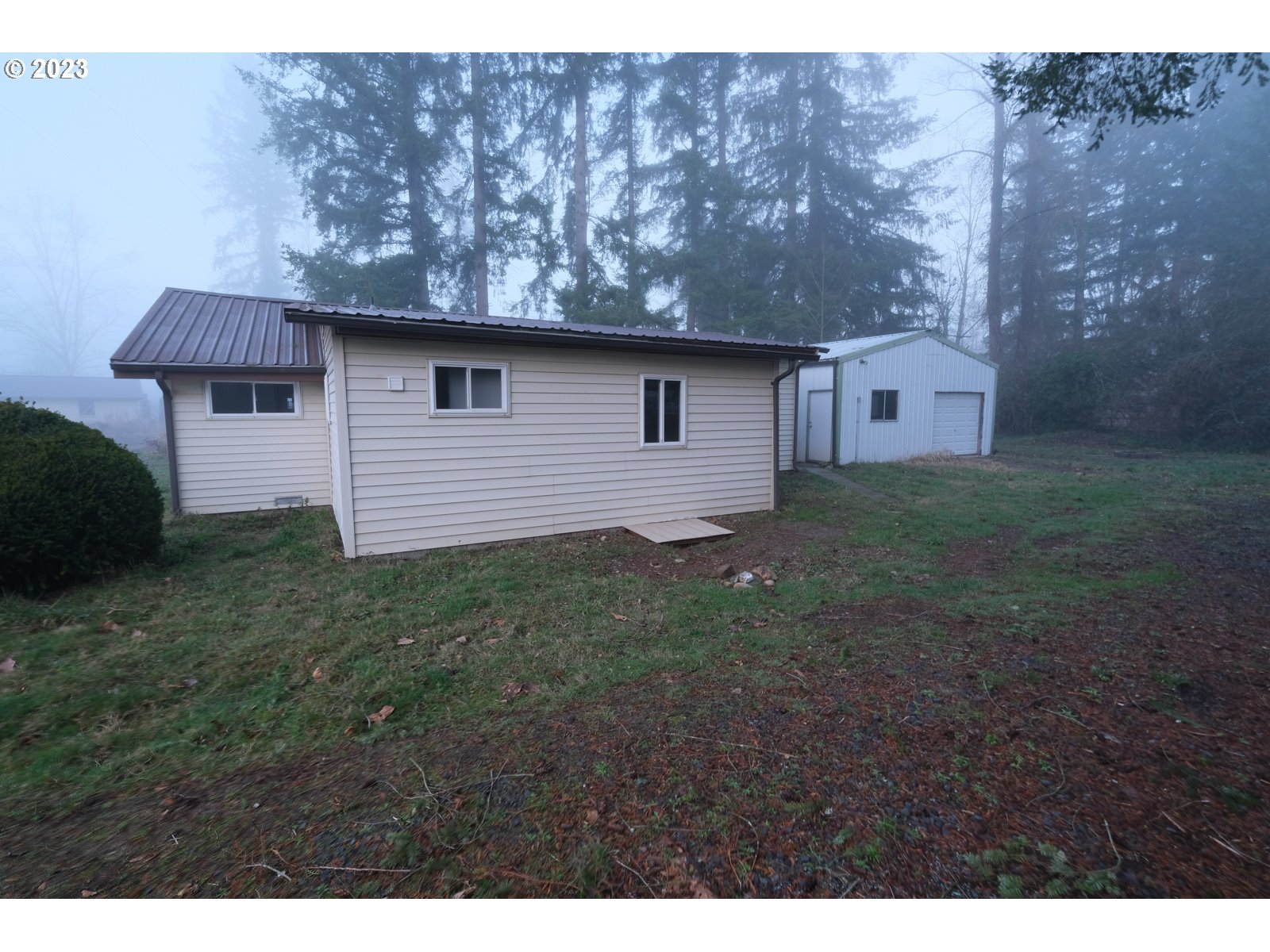122 Talbott Road Salkum, WA 98582 - Photo 4 of 32 a backyard of a house with lots of green space