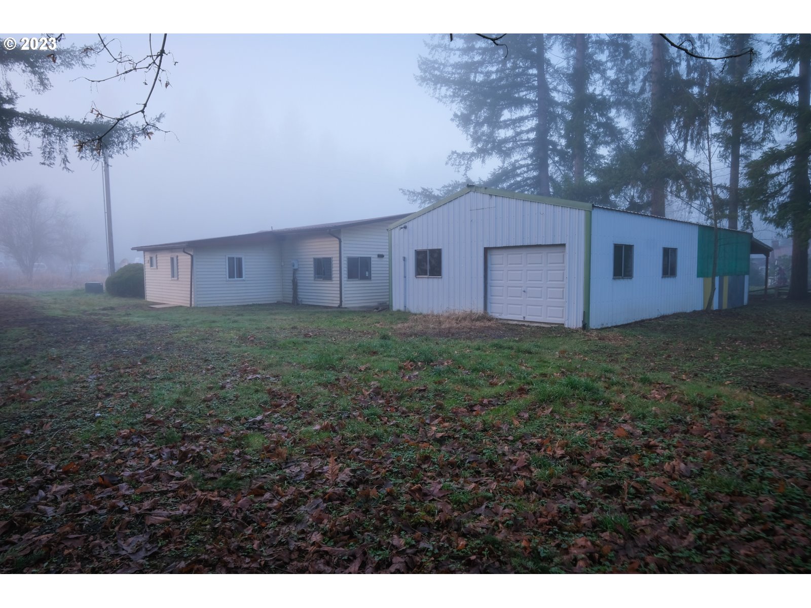 122 Talbott Road Salkum, WA 98582 - Photo 10 of 32 a view of a house with a yard and large tree