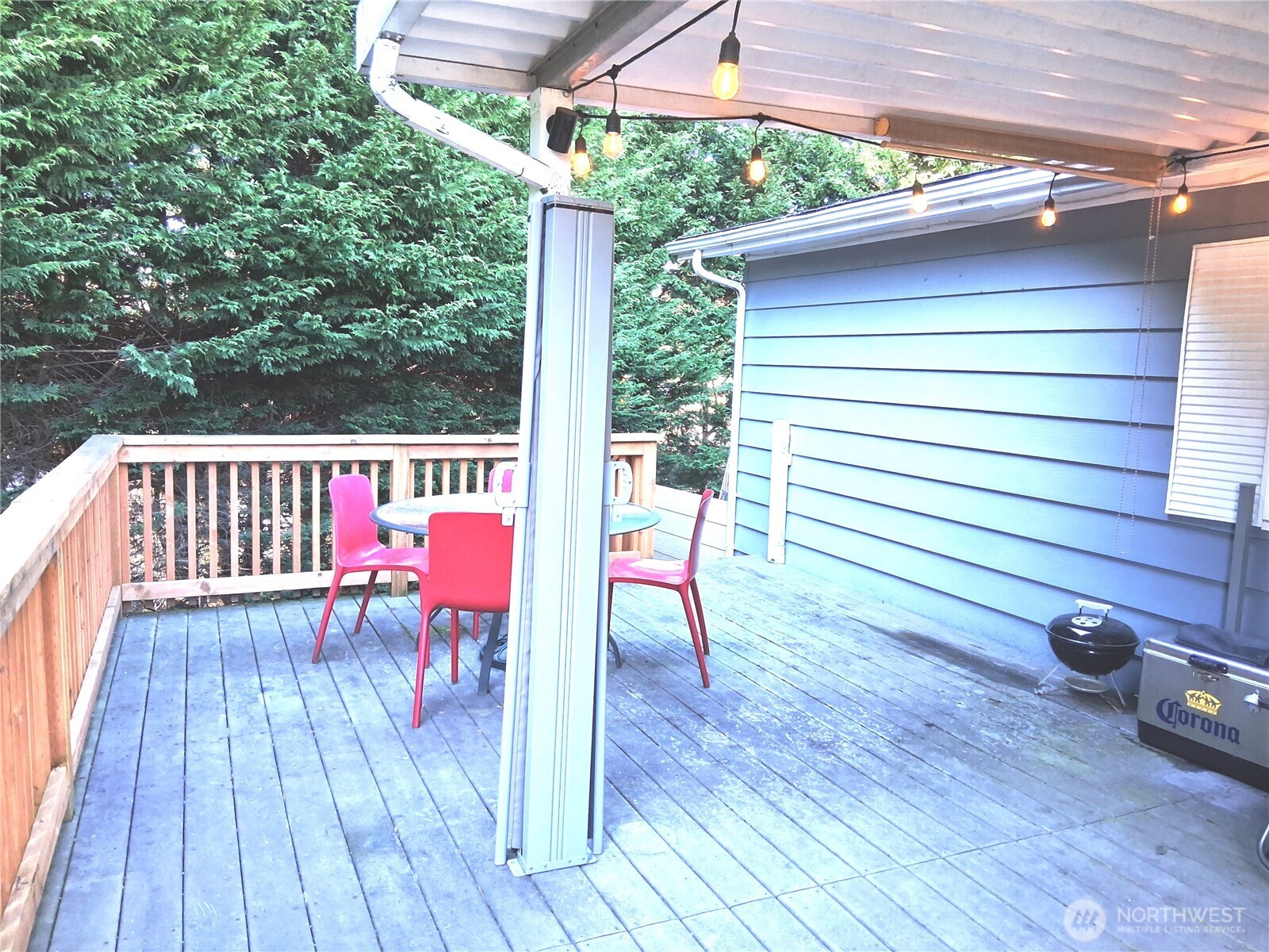 815 124th Street Southwest, Unit 36 Everett, WA 98204 - Photo 30 of 32 a view of a deck with wooden floor and outdoor seating