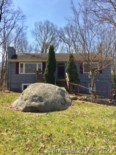 25 Hopp Brook Road Bethany, CT 06524 - Photo 1 of 1 a backyard of house with large tree and wooden fence