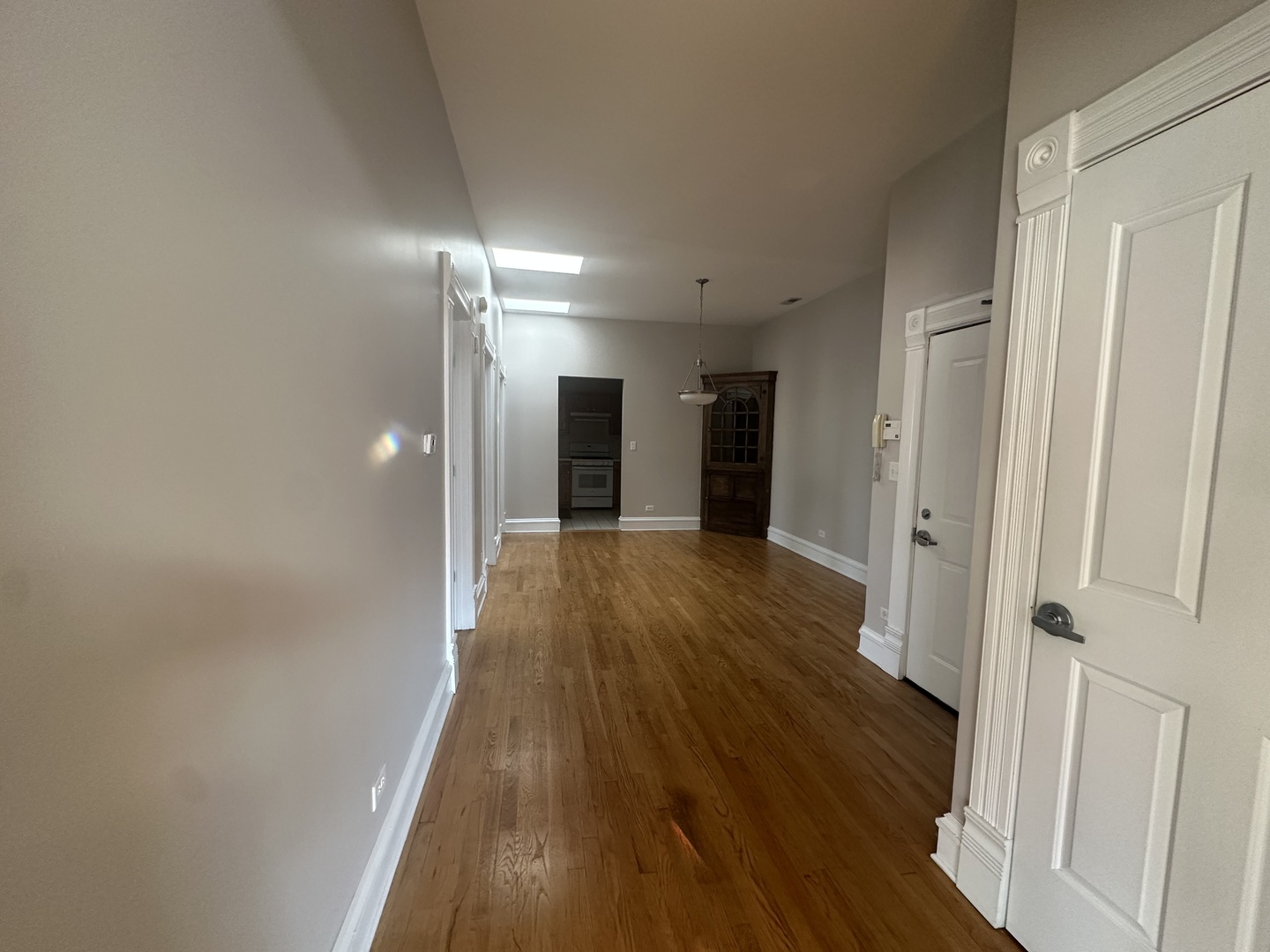 105 East 11th Street, Unit 2 Lockport, IL 60441 - Photo 6 of 14 a view of hallway with wooden floor