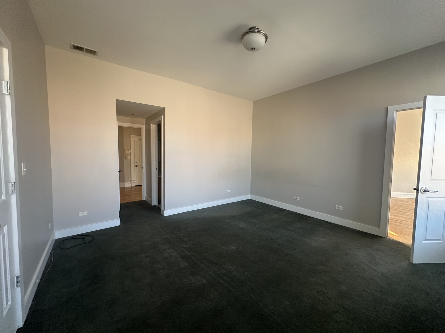 105 East 11th Street, Unit 2 Lockport, IL 60441 - Photo 10 of 14 a view of an empty room and window
