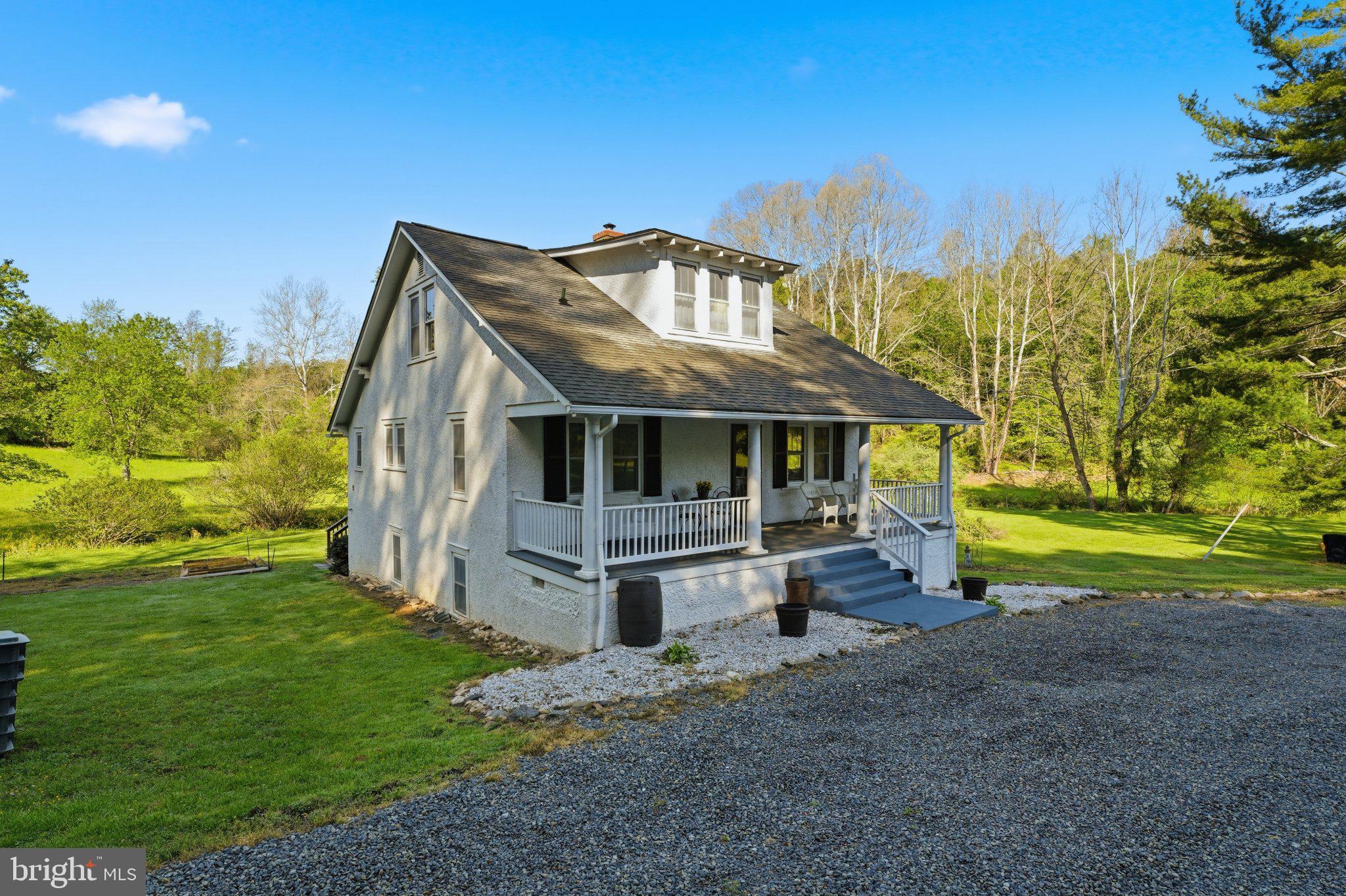 24 Sundown Lane Boston, VA 22713 - Photo 2 of 48 Charming home amidst serene greenery.