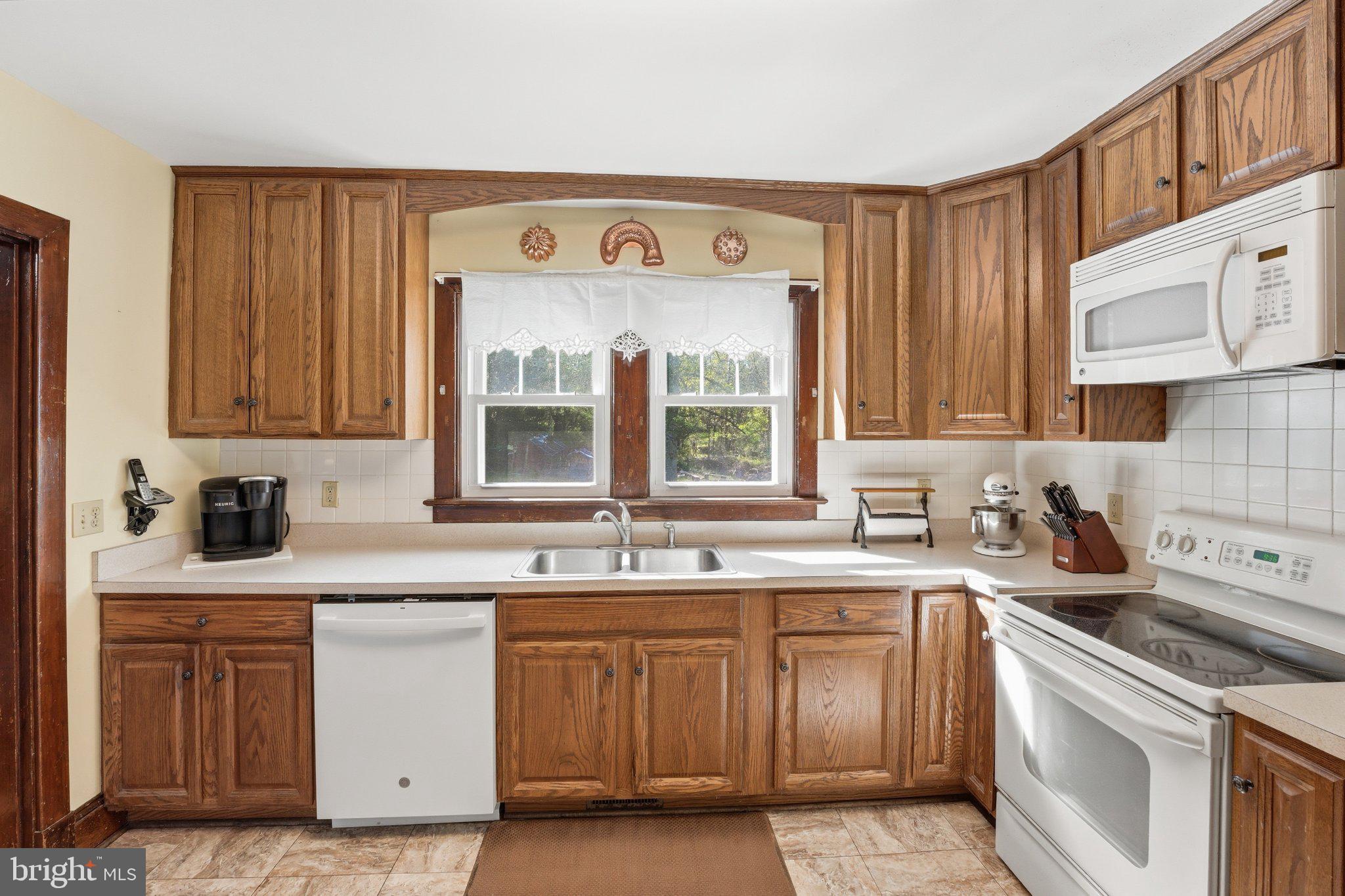24 Sundown Lane Boston, VA 22713 - Photo 21 of 48 Charming kitchen with warm wood tones.