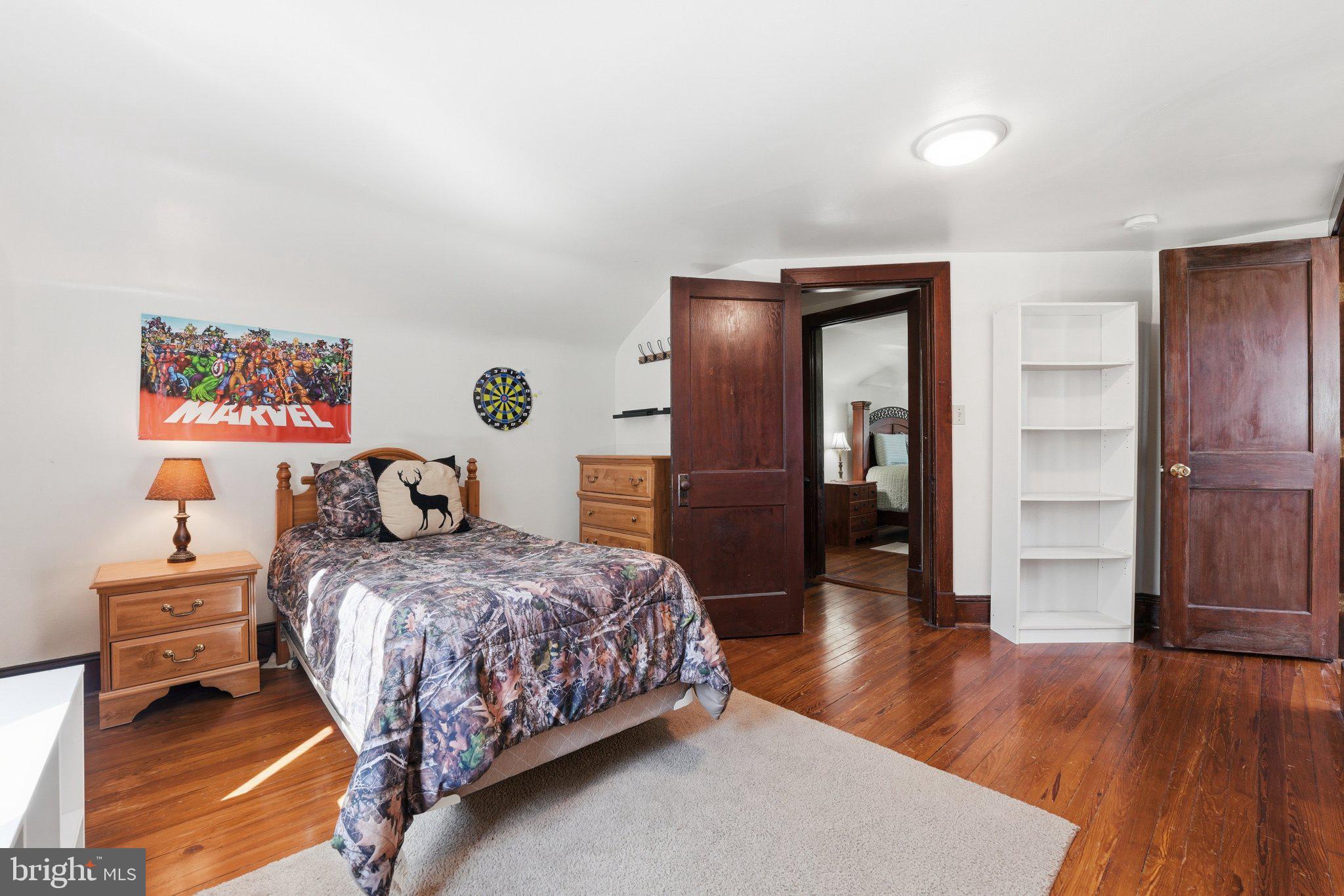 24 Sundown Lane Boston, VA 22713 - Photo 31 of 48 Cozy bedroom with warm wooden accents.