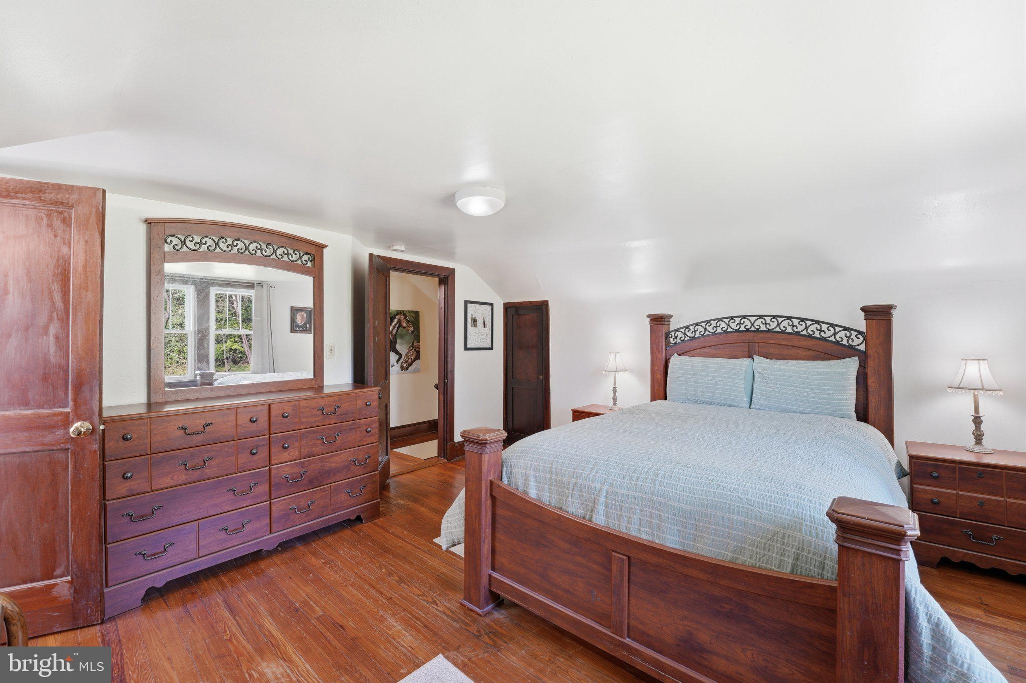24 Sundown Lane Boston, VA 22713 - Photo 34 of 48 Charming bedroom with classic wood accents.
