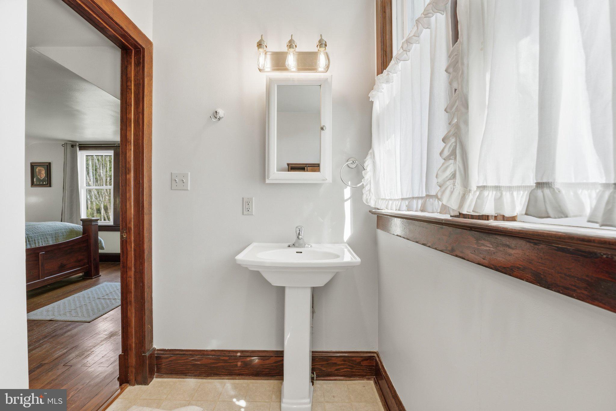 24 Sundown Lane Boston, VA 22713 - Photo 35 of 48 Bright and airy bathroom retreat.