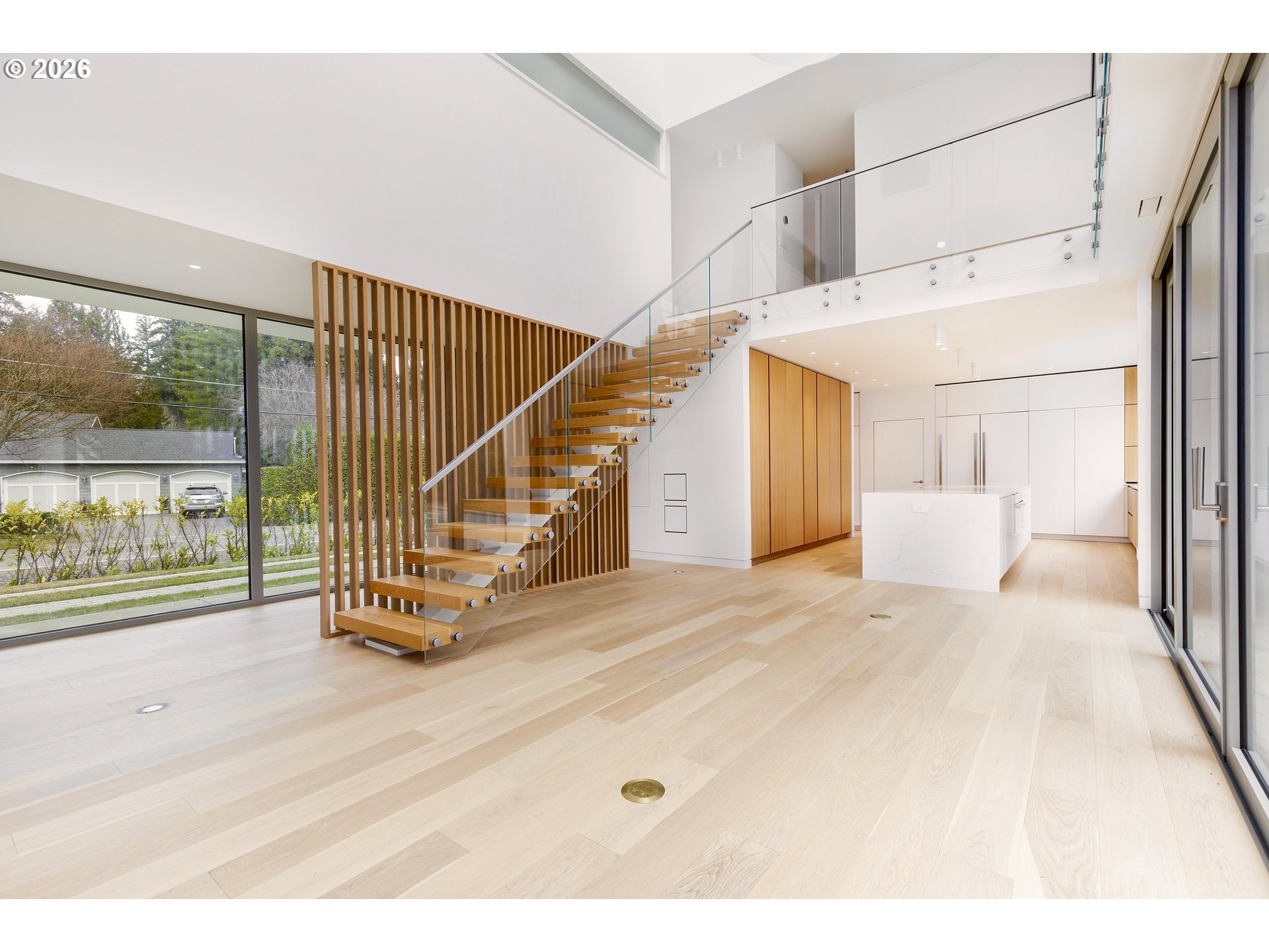 948 South Palatine Hill Road Portland, OR 97219 - Photo 14 of 45 a view of a hallway with wooden floor and windows