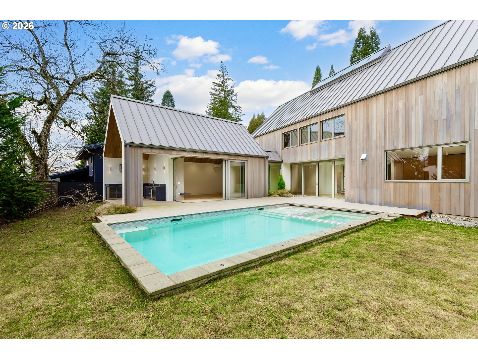 948 South Palatine Hill Road Portland, OR 97219 - Photo 3 of 45 a view of a house with pool and a yard