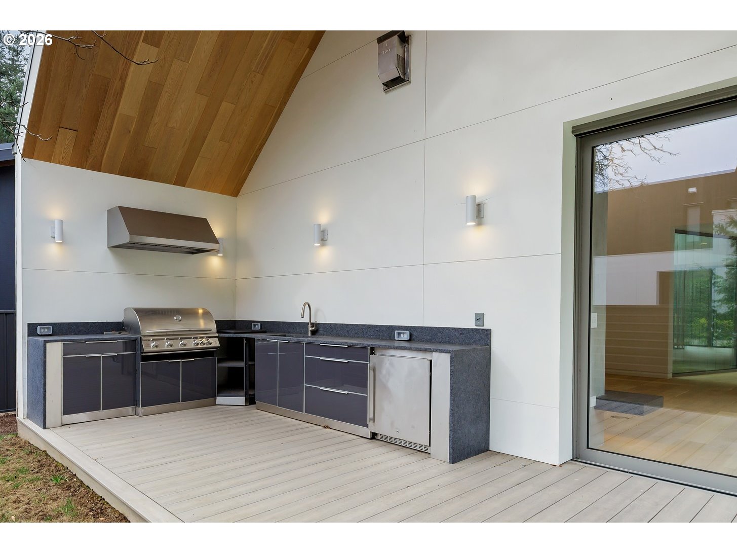 948 South Palatine Hill Road Portland, OR 97219 - Photo 8 of 45 a kitchen with stainless steel appliances a stove a refrigerator and a sink
