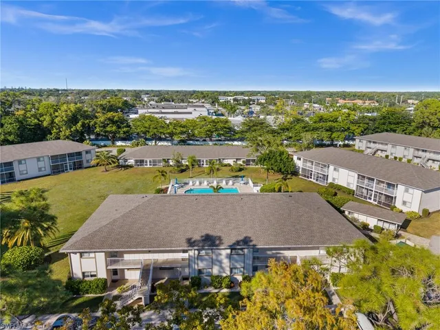 an aerial view of a house with a garden