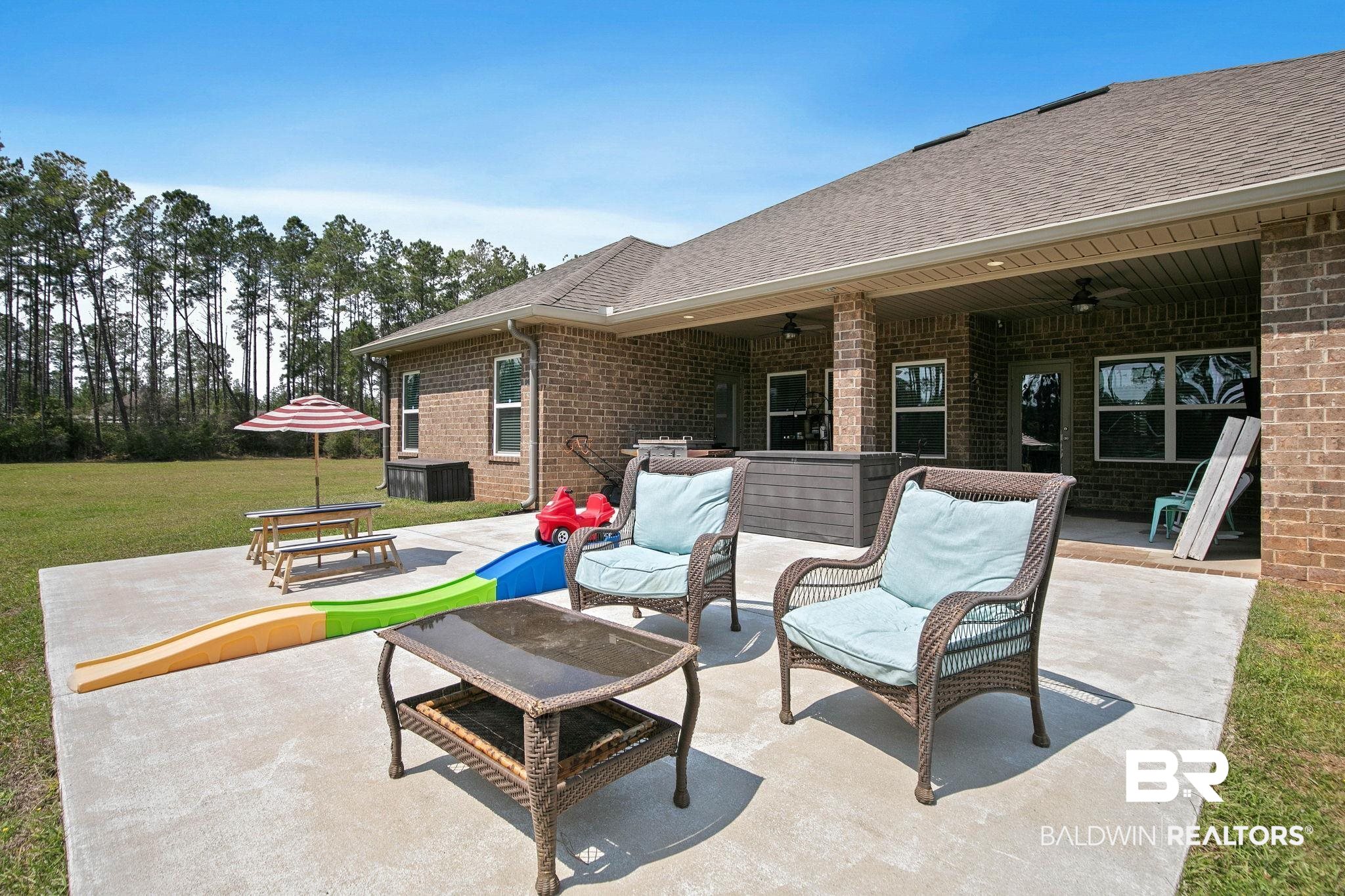12750 B Jenkins Pit Road Daphne, AL 36527 - Photo 56 of 89 View of patio with outdoor furniture, ceiling fan, and grilling area